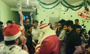New Year celebration. Santa Klaus in Hostel